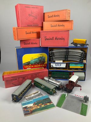 many different types of toy trains and train tracks