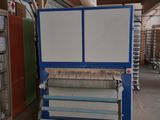 a picture of a machine that is sitting in a warehouse