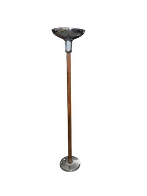 an image of a metal and wood floor lamp on a white background