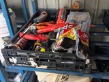 a shelf with a lot of tools and other items on it