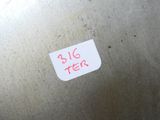 un autocollant portant l'inscription « Big Tea » sur le côté d'un récipient en métal