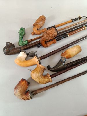 many different types of pipe smokings on a table