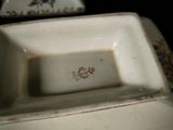 a white plate with a floral design on it