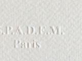 an image of a close up of a piece of paper with white writing on it