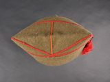 an image of a military cap with a red thread
