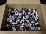 a box full of beer bottles sitting on a table