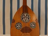 a wooden instrument that is sitting on a table