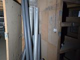 two pipes that are connected to a wall in a room