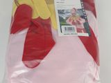 a bag of red and yellow gloves on a white table
