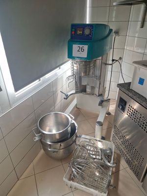 an image of a kitchen with a mixer and a bowl in it