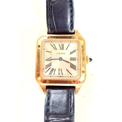 une montre dont le cadran comporte des chiffres romains