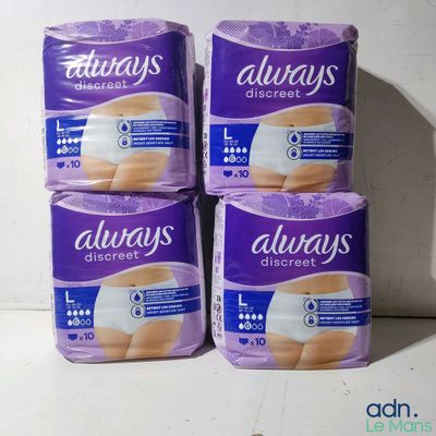 three packs of always discreet underwear sitting on top of each other