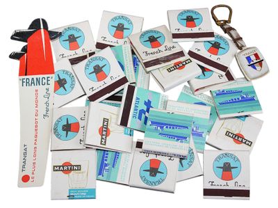 a pile of luggage tags and a pair of scissors on a white surface