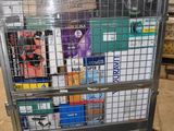 a metal cart with many items in it in a warehouse