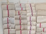 a lot of bags that are stacked on top of each other