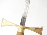 a gold and silver sword with a gold handle on a white background