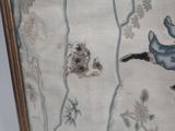 a picture of a picture of a cat and a dog on the wall
