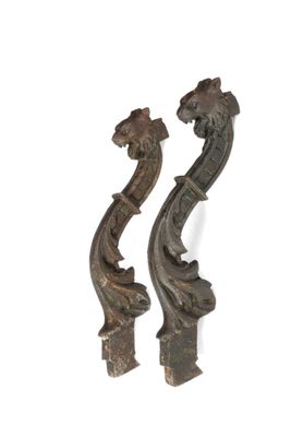 pair of antique cast iron door handles in the shape of a dragon