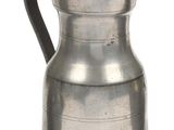 an old silver pitcher with a handle on a white background