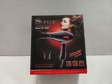 packaging of a hair dryer sitting on top of a white table