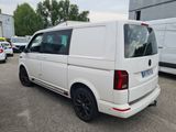 a white van that is parked in a parking lot