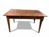 a small wooden table with a drawer on it