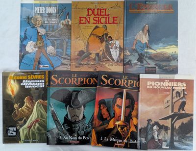 un grand nombre de livres posés sur une table