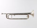 an old silver trumpet on a white background