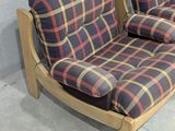 two chairs that are sitting next to each other on the floor