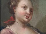 portrait d'une femme en robe rose avec un nœud rouge