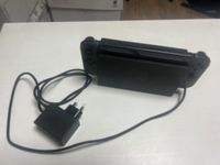 Une NINTENDO Switch avec son doc (démarre). (photo 3)