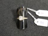 a ring that is sitting on top of a black object