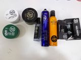 many different types of hair products laid out on a table