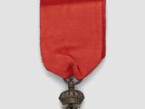 an image of a red ribbon with a star on it