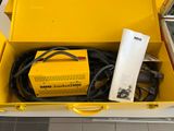 a yellow box that has a bunch of wires in it