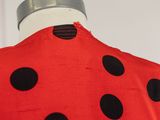 a close up of a ladybug dress on a mannequin mannequin