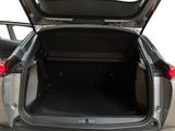 a trunk of a car with its doors open