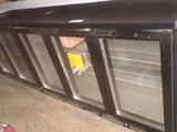 an image of a refrigerator that is in a garage