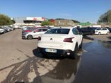 a lot of cars parked in a parking lot