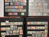 several different types of stamps are displayed in a display case