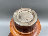 a close up of a metal object on a table