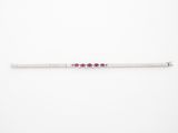a silver bracelet with pink stones on a white background