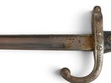 a close up of a sword on a white background