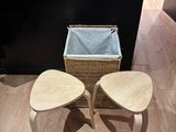 two stools and a basket on the floor