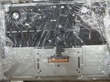 a laptop that is wrapped in plastic and sitting on a table