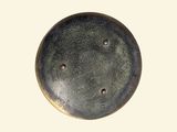 an image of a metal object with holes in it