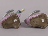 pair of pink and blue shoes with a bird on them