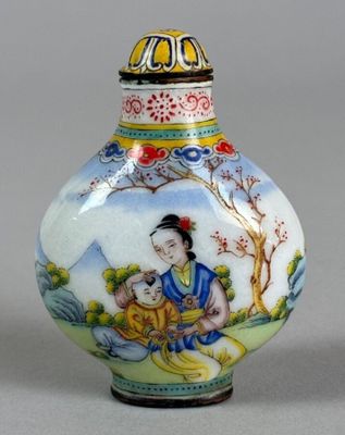 a small vase with a painting on it that is sitting on a table