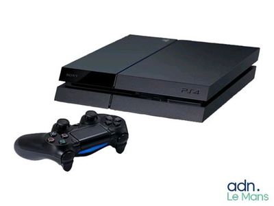 un gros plan sur une console de jeux vidéo et une manette