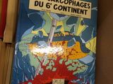 a picture of a book in a box on a shelf
